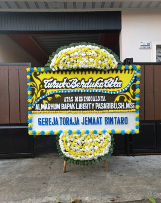 Papan Bunga Duka di Batang Batang